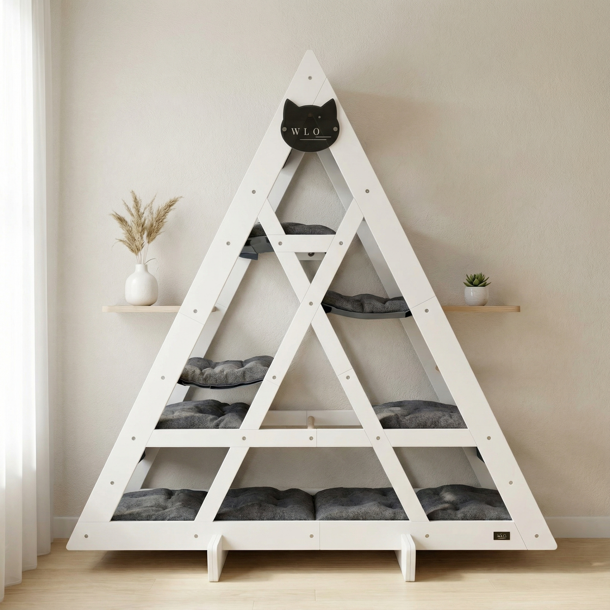 Triangular pet bed structure with multiple levels in a room setting
