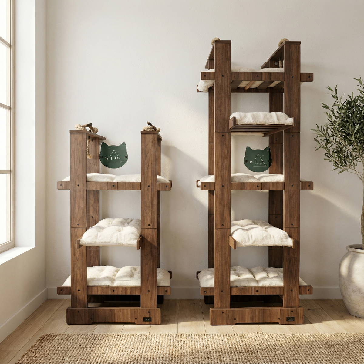 Two wooden cat trees with cushions in a room with a window and plant.