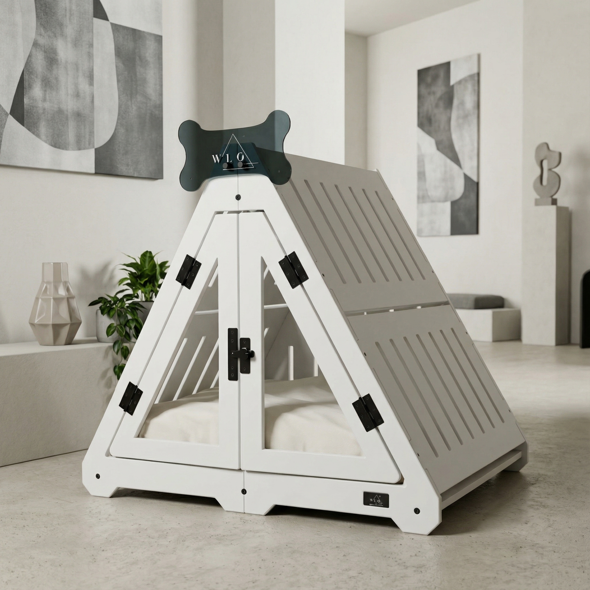 White pet playpen with a black bone-shaped toy in a modern room.
